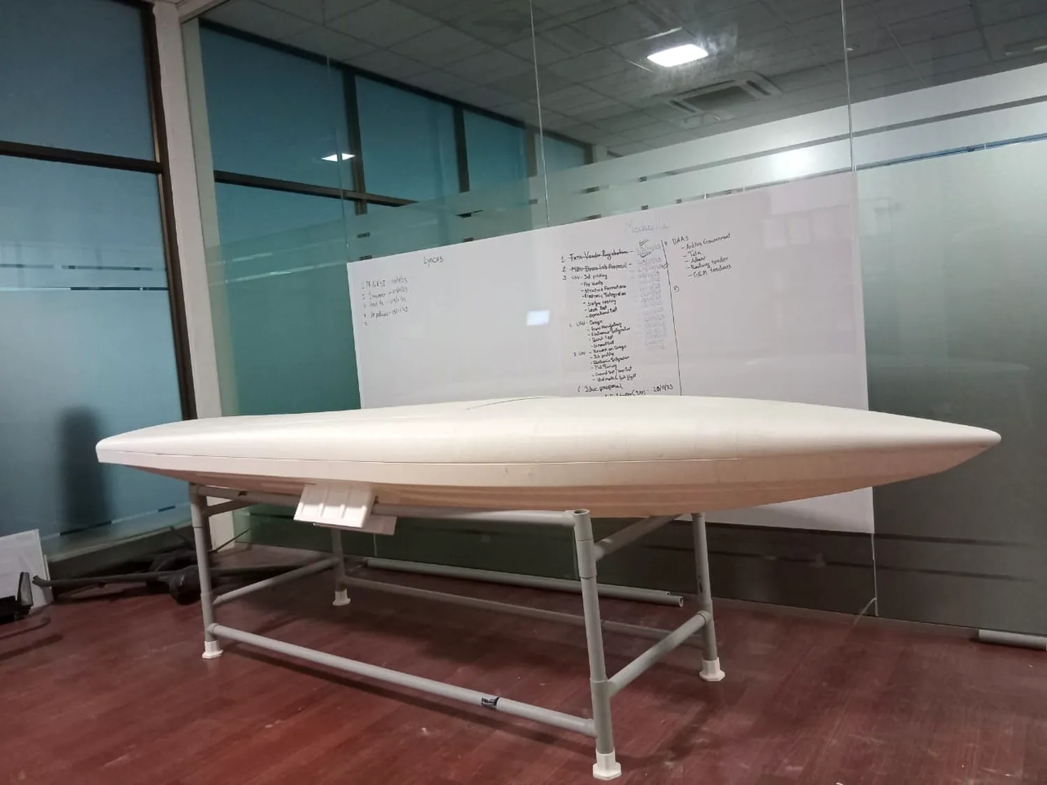 Fuselage shell &mdash; Full-size shell off the tooling, on the trestle